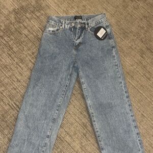 Brand new never worn tag on White Fox Mid Rise Straight Leg Jeans for sale!
